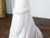 A vintage Italian Midcentury white porcelain sculpture depicting a greyhound dog sitting obediently on his behind. Lend an...