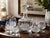 Bring timeless nautical elegance to your home bar with this handsome vintage seven-piece Captain’s decanter set, featuring...