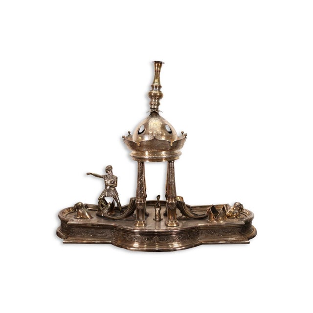 A Meridian Britannica Company ornamental silver plated centerpiece candle holder. This incredible table piece features a...