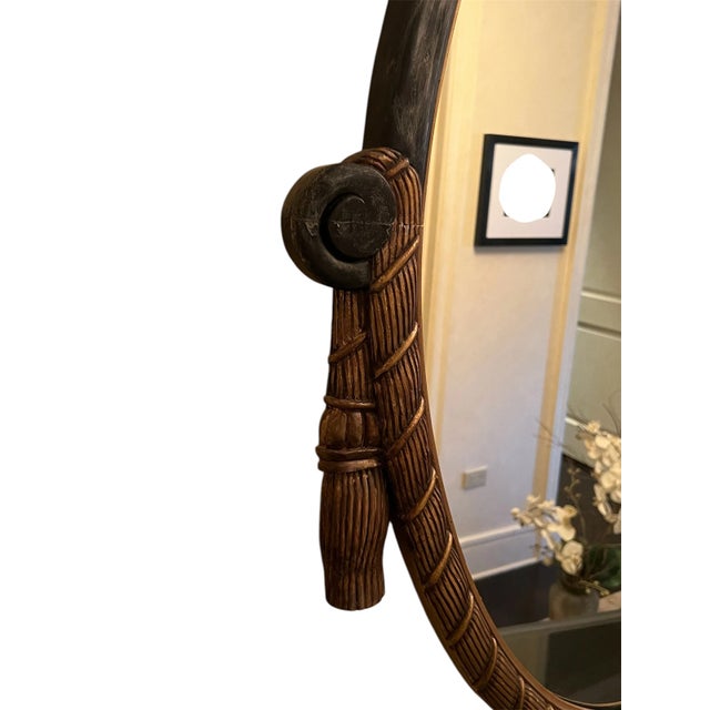 This beautiful vintage 1920's French art deco oval wooden mirror is one of a king. Its has intricate detail in the gilded...