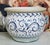 Saca Castelli, Italy, early 20th century: Large glazed earthenware cachepot or planter, richly hand-decorated with a...