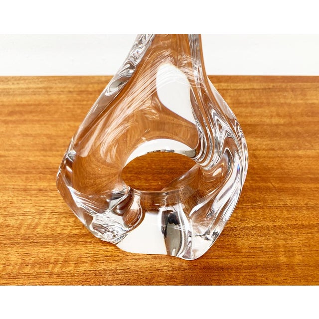 Mid Century glass light from the French manufacturer Daum. The organically shaped glass feet of this manufacturer are...