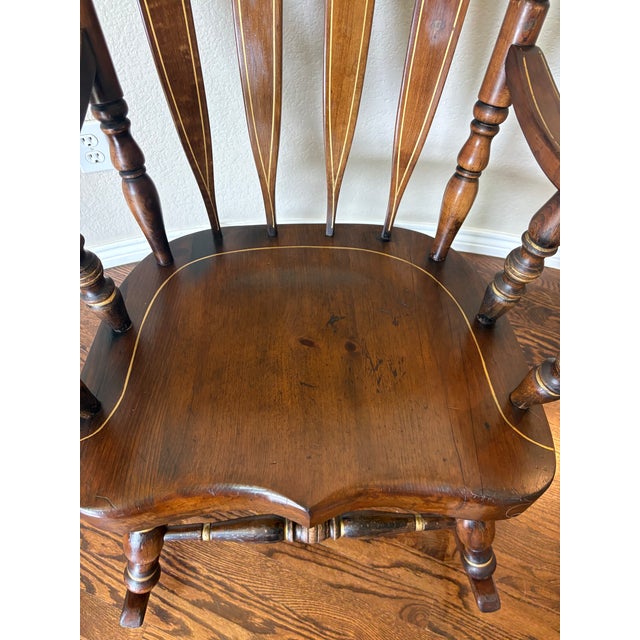 Dating to December 1970, this character-rich Virginia House rocking chair is distinguished by an exceptionally well-...