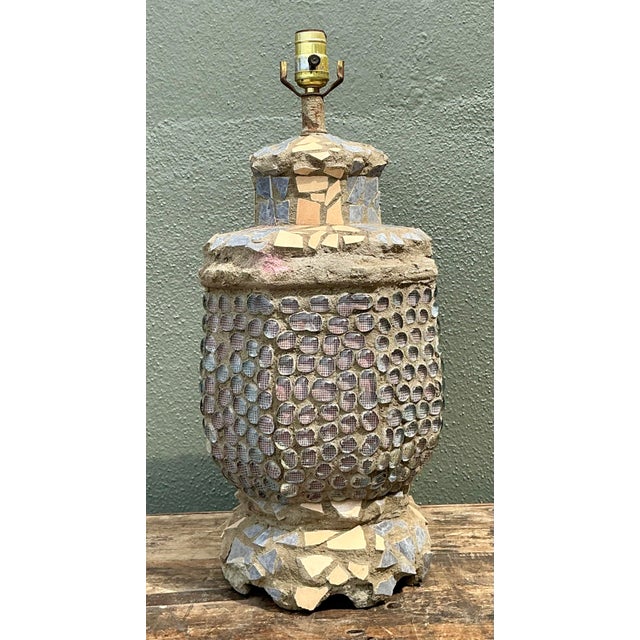 This unique vintage table lamp is a masterful example of the Brutalist and found-object movements of the 1970s. Its...
