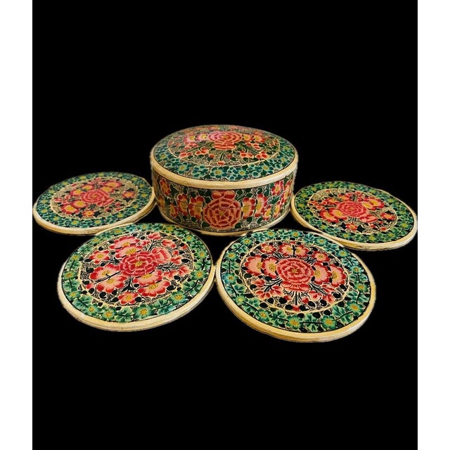 Beautiful vintage handcrafted coaster set with matching box. Made of paper mache hand painted flowers very colorful pink &...