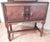 This distinctive and one of a kind piece was hand-crafted in the early 1900's by an artisan furniture maker. Perfect for a...