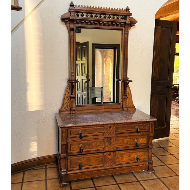 Renaissance Revival Dresser with Mirror circa 1880 A large carved antique piece with drawers and mirror. Original teardrop...