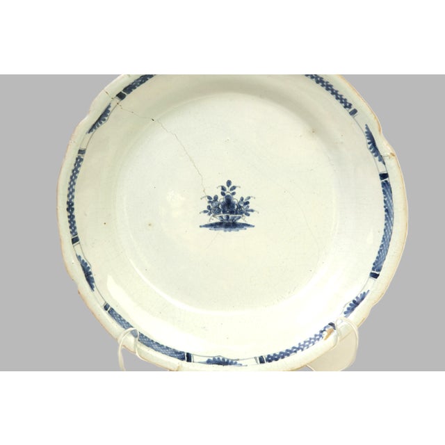 Distinctive early 18th century small floral plate from Saint-Cloud.. Thickly-potted. Hand-painted with alternating...