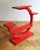 A wooden flower stand painted in bright red, produced in late 1940’s. This piece is a nice example of the Avant-garde...
