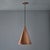 Monumental 1950s Conical Perforated Copper Pendant Attributed to Paavo Tynell. Executed in perforated copper with an...