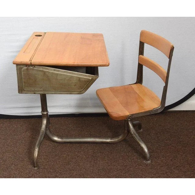 Remember your school days with this charming desk set. Made of steel with beautiful cabriolet legs and a maple desktop and...