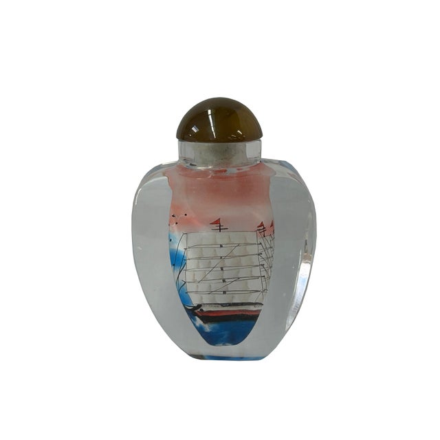 This piece of art features a mesmerizing glass bottle vase adorned with intricate Chinese-inspired oriental scenery. The...