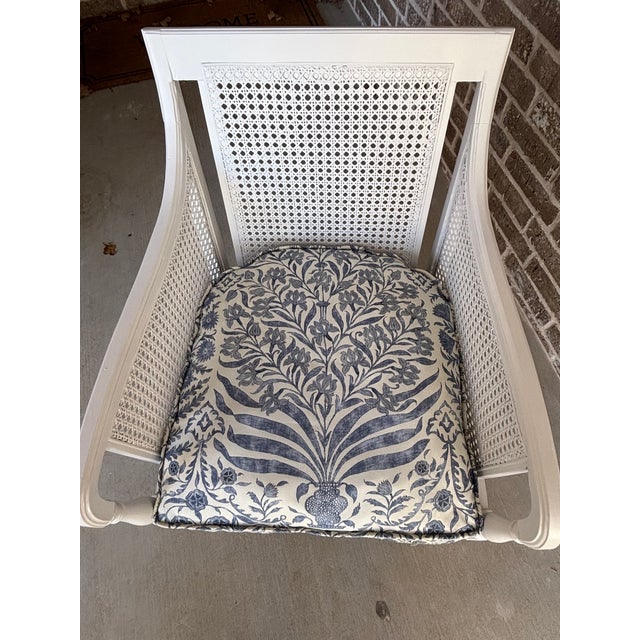Vintage caned armchair with cushions in Sameera fabric by Oscar de la Renta MAKER'S MARK: Tag underneath seat cushion...