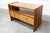 Low cabinet, TV stand, coffee table with drawers, or room divider, made by Maison Regain in solid elm in the 1960s. It is...