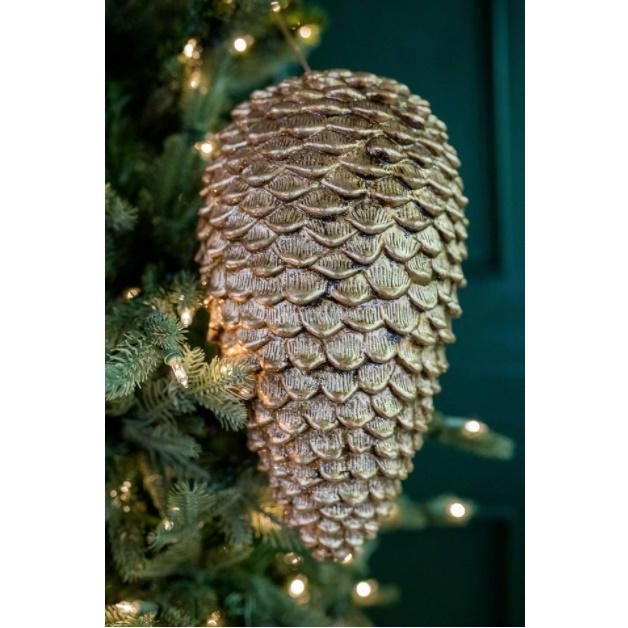 - Spruce up your decor with some of our finest ornaments like these beautiful glitter pine cones. The natural, earthy...