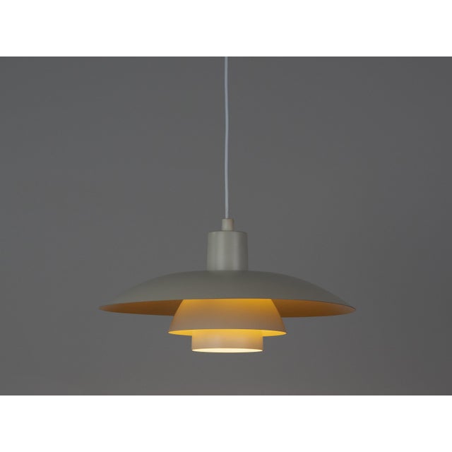 The ph 4/3 pendant lamp is a true classic of danish design, created by renowned danish designer and architect poul...