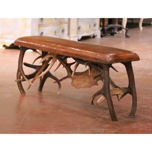 This striking antique Alpine bench was crafted in the Black Forest tradition, likely in Austria’s Tyrolean region, circa...