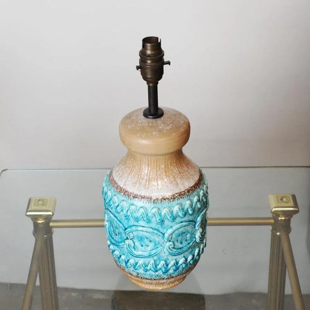 A vintage desk lamp by Italian house Nuovo Rinascimento from the 1960s. Made with scratch décor technique and a hand-...