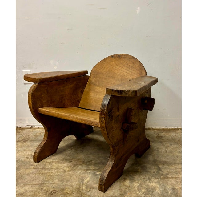 Some chairs invite you to sit. Others invite you to stay. This vintage English oak Brutalist lounge chair possesses that...