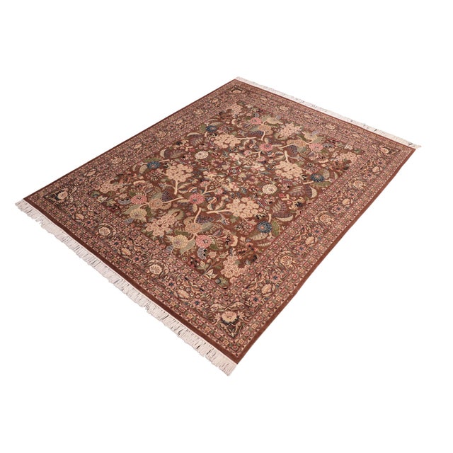 Designed with mesmerizing intricacy and gorgeous color palette, this hand-knotted masterpiece demonstrates the beauty and...