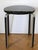 This round side or bistro table dates from the 1940s and is made of black lacquered wood and aluminum. It is in very good,...