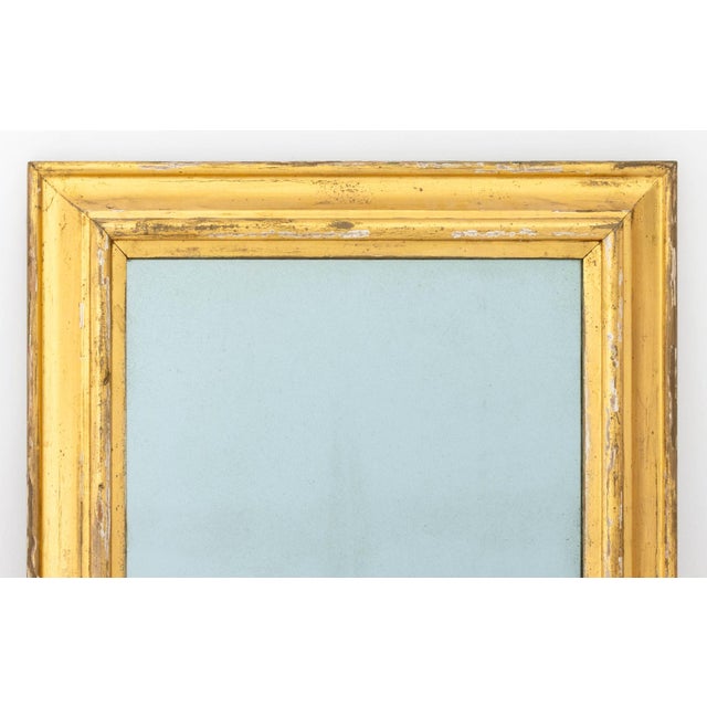 Modern Rectangular Giltwood Framed Mirror. Mirror plate: 27.25" H x 15.25" W; frame: 34.25" H x 22" W x 2" D. Provenance:...