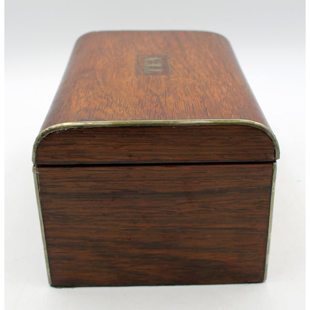 Mid-19th century English Victorian tea caddy box. Top inlaid "TEA." Faux rosewood grained inner lids. Deal secondary wood....