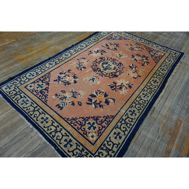 Antique Peking Chinese Wool Coral Hand Knotted Pile Rug, Country of Origin: China, Circa Date: 1890s. This exquisite late...