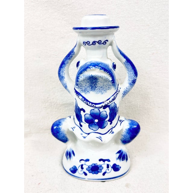 Fun vintage blue and white frog candle holder. Holds a taper candlestick. Chinoiserie feel. Perfect to add as an accent to...