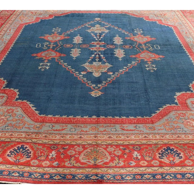 Squared Shape Antique Turkish Oushak rug in vibrant blue, red, medallion geometric design, kwarugs Keivan Woven Arts /...