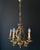 The chandelier is made of bronze. It’s adorned with beautiful flowers—they look just like the real thing! Exquisite and...