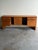 Danish Mid-Century Modern sideboard crafted in warm teak, featuring clean architectural lines and beautiful, consistent...