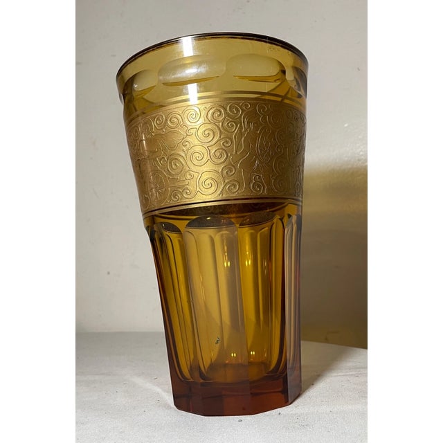 Up for sale is a high quality antique handmade Moser Karlsbad amber crystal glass vase. It features a sleek silhouette...