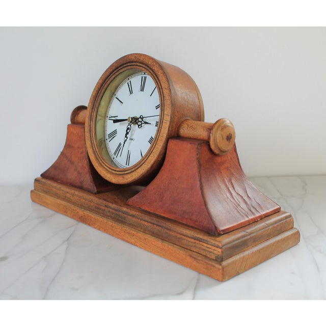 Vintage Quartz traditional style leather wrapped wooden mantel or desk clock. Uses one AA battery. Some age wear to wood...