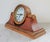 Vintage Quartz traditional style leather wrapped wooden mantel or desk clock. Uses one AA battery. Some age wear to wood...