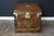 This Louis Vuitton trunk is quite unique due to its cube shape and the fact that it is made entirely of leather. The...