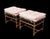 This Pair of mid-century Hollywood Regency faux bamboo benches has a lot of decorative charm with its combination of...
