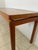 d-SCAN solid teak long console table with rounded corners.