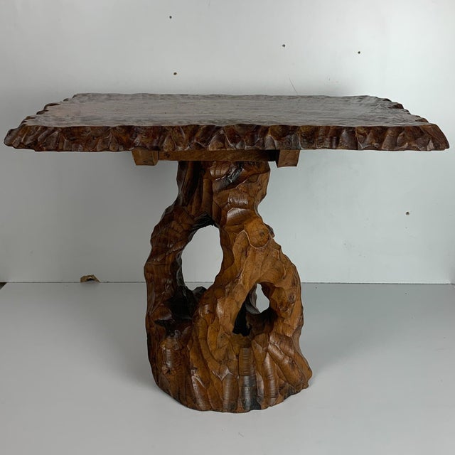 Gorgeous carved side table from The Netherlands. These asian revival tree trunk root side tables were popular during the...