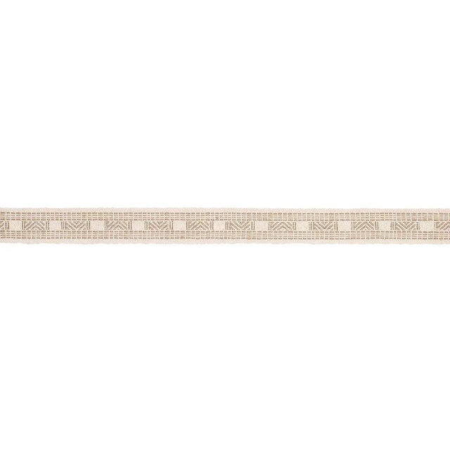 Inspired by an antique blanket from India, Nael Linen Cotton Tape is made of stiff, irregular yarns and woven on a...