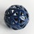 This contemporary little orb is made of thin ceramic strips, which are hand formed, and sparingly shaped into a rounded...