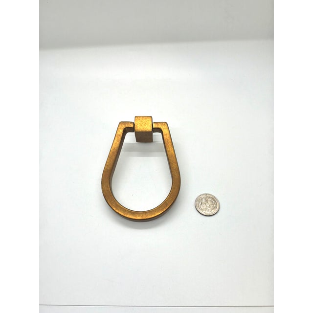 Baker Large Pull Honey Bronze. Contemporary Design, Oval Shaped.