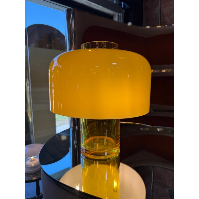 Iconic LT226 table lamp designed by Carlo Nason for Mazzega, Italy, circa 1970s. Featuring a sculptural yellow Murano...