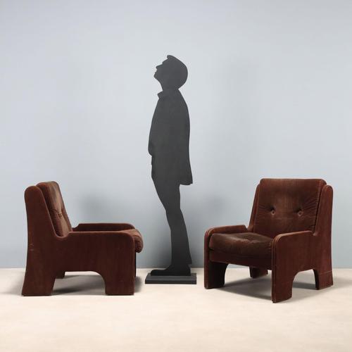 Armchairs with foam cushion padding, fabric upholstery. This piece is attributed to the mentioned designer/maker. It has...