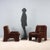 Armchairs with foam cushion padding, fabric upholstery. This piece is attributed to the mentioned designer/maker. It has...