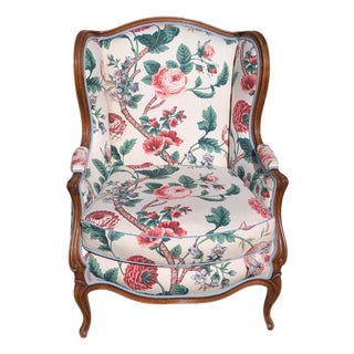 Early 20th Century French Country Louis XV Style Carved Walnut Bergere Chair For Sale