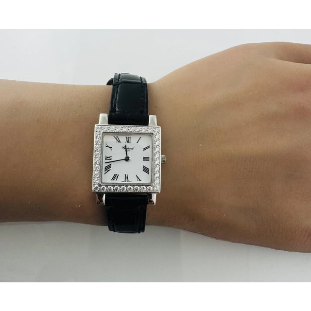 Chopard 18K White Gold Diamond Ladies Watch Model: 426 1 Number: 532157 This classic Chopard ladies watch is set in 18K...