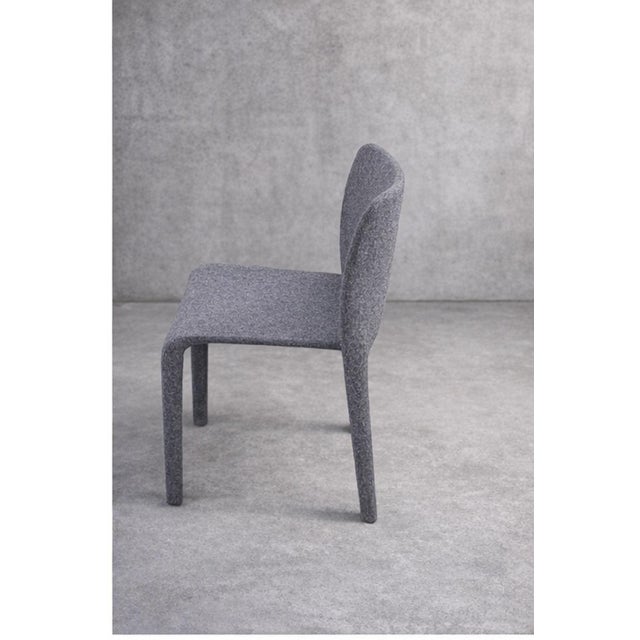 Offered here are authentic “First” dining chairs designed by Stefano Giovannoni for Magis, a renowned Italian design house...