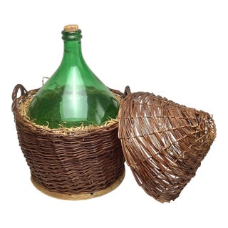 Antique Demijohn Green Glass Bottle in Original Basket For Sale