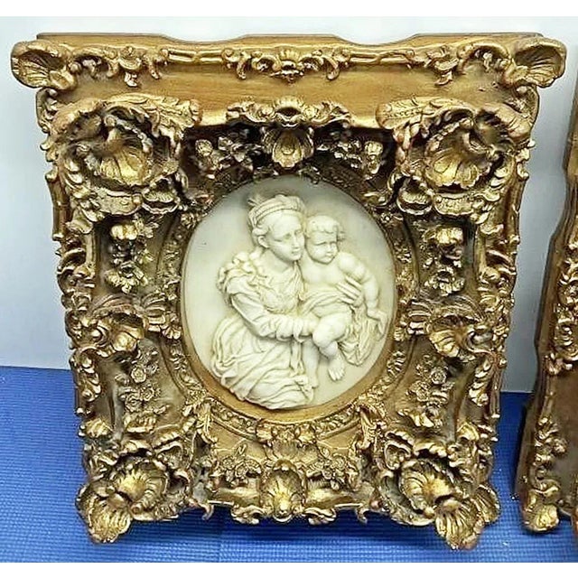 Lovely romantic mother and child cast marble composite resin plaque in stunningly ornate rococo gilt frames. Need to add...